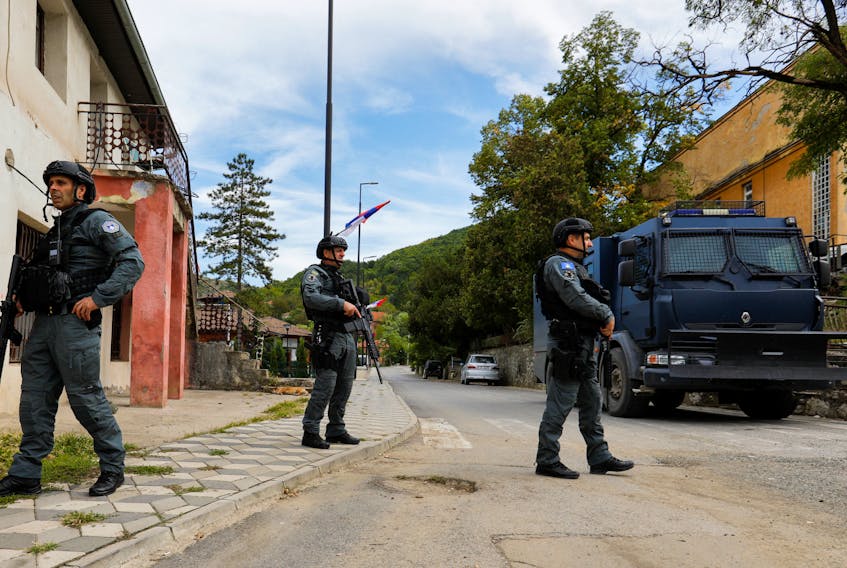 BANJSKA, Kosovo (Reuters) - A battle between police and armed men holed up in a monastery turned a quiet village in northern Kosovo into a war zone, residents and police said on Wednesday, in the
