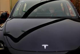 BEIJING (Reuters) - Tesla's Shanghai plant has started Model Y production with new cost-cutting manufacturing methods, Chinese state media Shanghai Securities News reported on Wednesday. The company