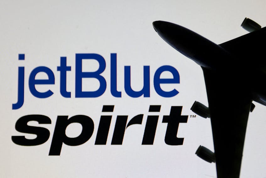 (Reuters) - Democratic Senator Elizabeth Warren asked JetBlue CEO Robin Hayes to answer if the low-cost airline privately forecast its planned $3.8 billion merger with Spirit Airlines will