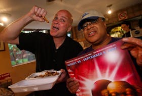 AUGUST 19, 2007---**for fringe fest***from left--Craig McLean and Ken Pinto are two of the  judges for Poutine from Alexander's on Queen st. in Halifax as part of Fringe Festival activities.
