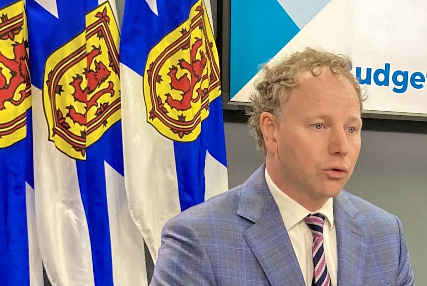 Finance Minister Allan MacMaster presents a budget forecast update for Nova Scotia in Halifax on Thursday, Sept. 28, 2023.