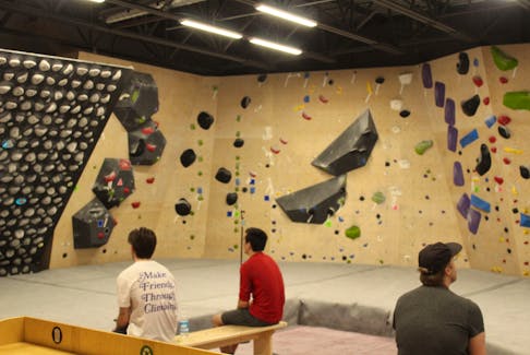 Three climbers ready to conquer the challenge of The Cove's Bouldering Wall. Cameron Kilfoy/The Telegram.