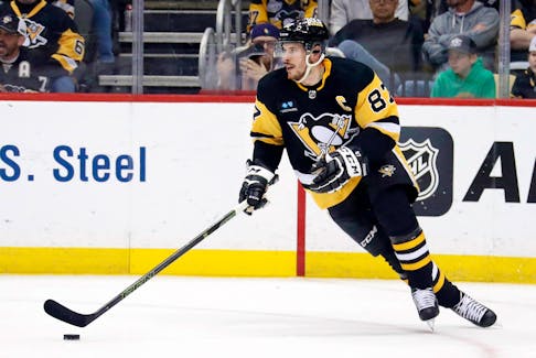 Apr 1, 2023; Pittsburgh, Pennsylvania, USA;  Pittsburgh Penguins center Sidney Crosby (87) skates with the puck against the Boston Bruins during the second period at PPG Paints Arena. Mandatory Credit: Charles LeClaire-USA TODAY Sports  Pittsburgh Penguins centre Sidney Crosby skates with the puck against the Boston Bruins during the second period of Saturday's game at PPG Paints Arena. - Charles LeClaire-USA TODAY Sports