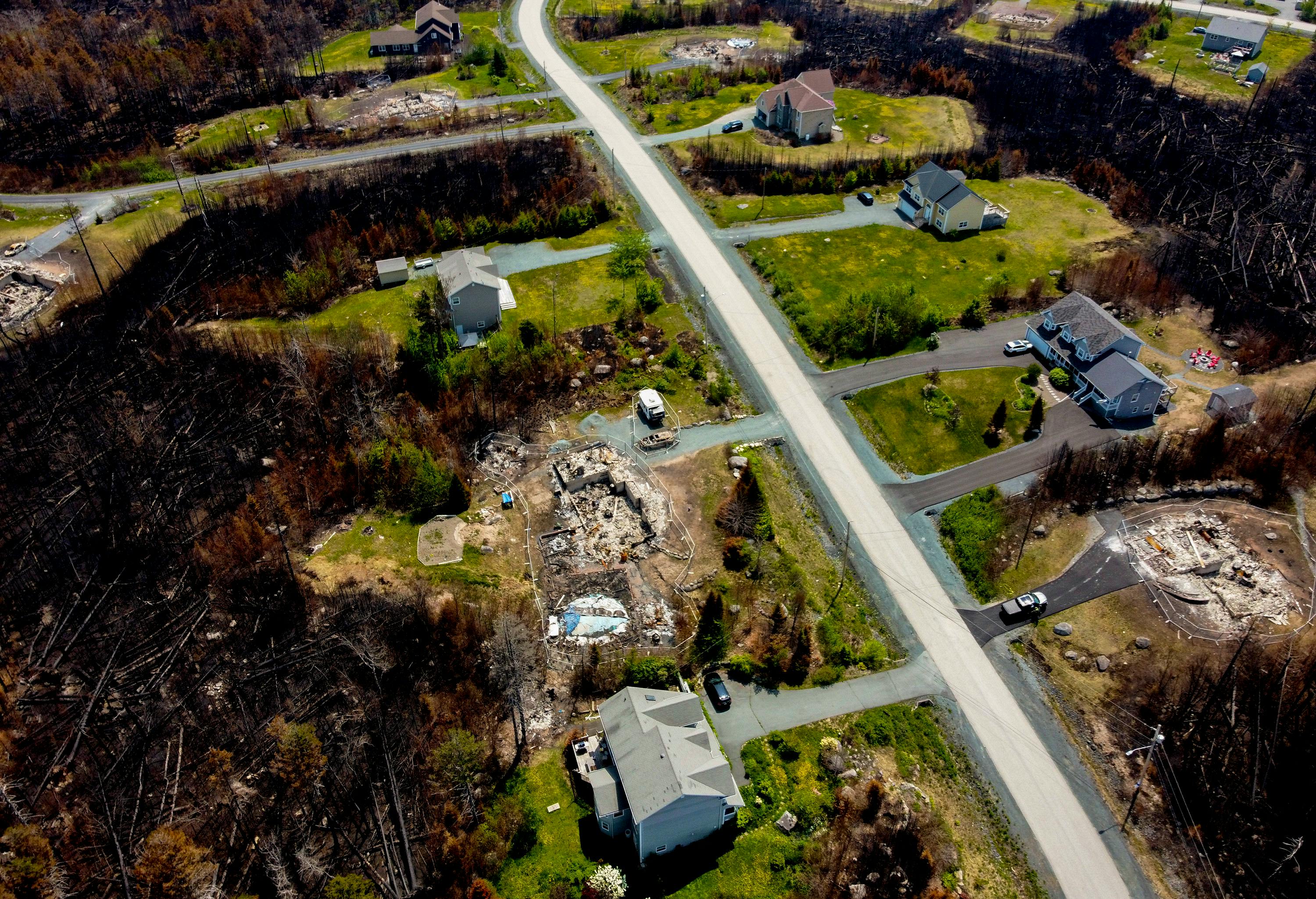 No answer on when Westwood Hills subdivision, scorched by Tantallon  wildfires, will get emergency exit