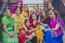 The Truro Giddha crew gathered for photos after their traditional dance. Giddha is a popular form of folk dancing which originated in the Punjab region. Nick Gaines