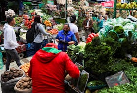 By Nelson Bocanegra BOGOTA (Reuters) - Colombia's inflation likely slowed in September due to a moderation of domestic consumption, a Reuters poll revealed on Friday, though forecasts for the year