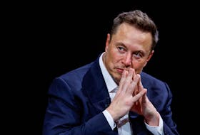 By Sarah Marsh and Andreas Rinke BERLIN (Reuters) - Billionaire Elon Musk waded into German politics on Friday, sharing the post of another account on his social media platform X that attacked the