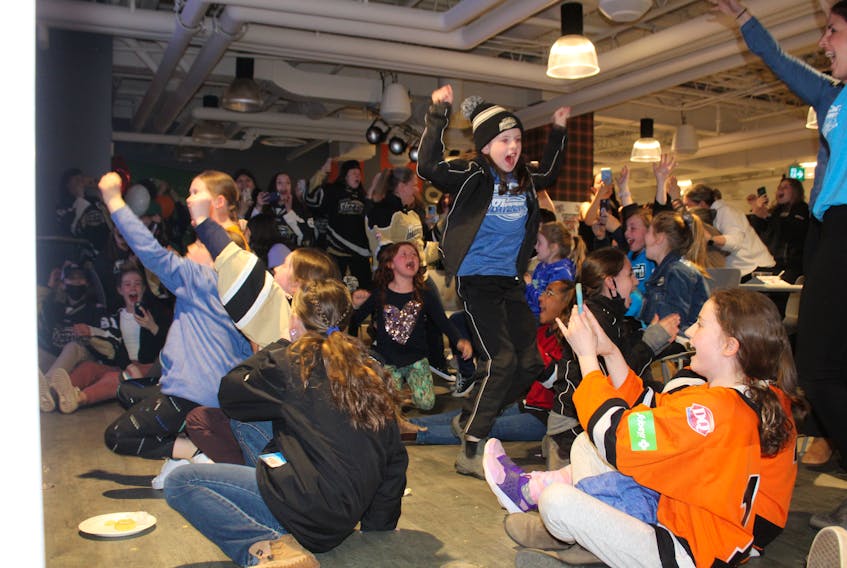The moment Sydney was named winner of the Kraft Hockeyville national contest in May 2022, female hockey players of all ages jumped up in celebration amid screams and hugs at Cape Breton University pub, The Pit. CAPE BRETON POST FILE PHOTO.