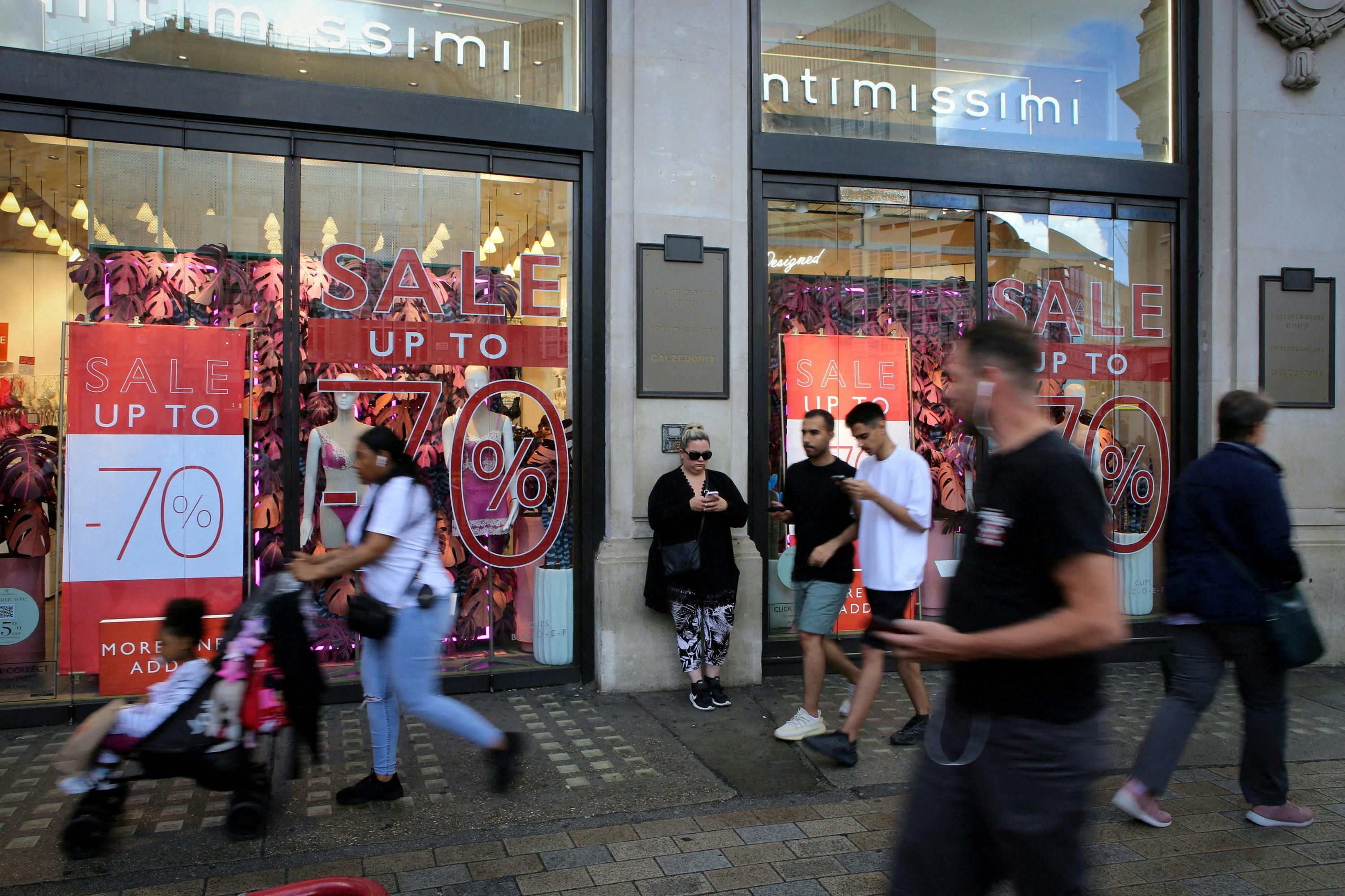 Heavy winter sweaters coats pile up at stores as warm weather