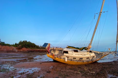 The presence of a stranded sailboat near the Rice Point wharf has sparked environmental concerns among the local residents. Monica Lacey, who owns a property in the area, first noticed the sailboat running aground since late August. Contributed