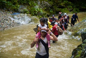 By Elida Moreno PANAMA CITY (Reuters) - The number of people crossing the perilous Darien Gap linking Panama and Colombia has hit a record high of 400,000 in the year to September, official data