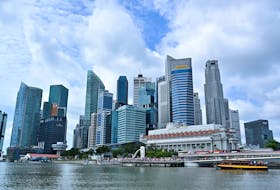 By Xinghui Kok SINGAPORE (Reuters) - Singapore's population grew 5% in a year as foreign workers returned to the city-state following the pandemic, data released on Friday showed. There were 5.9