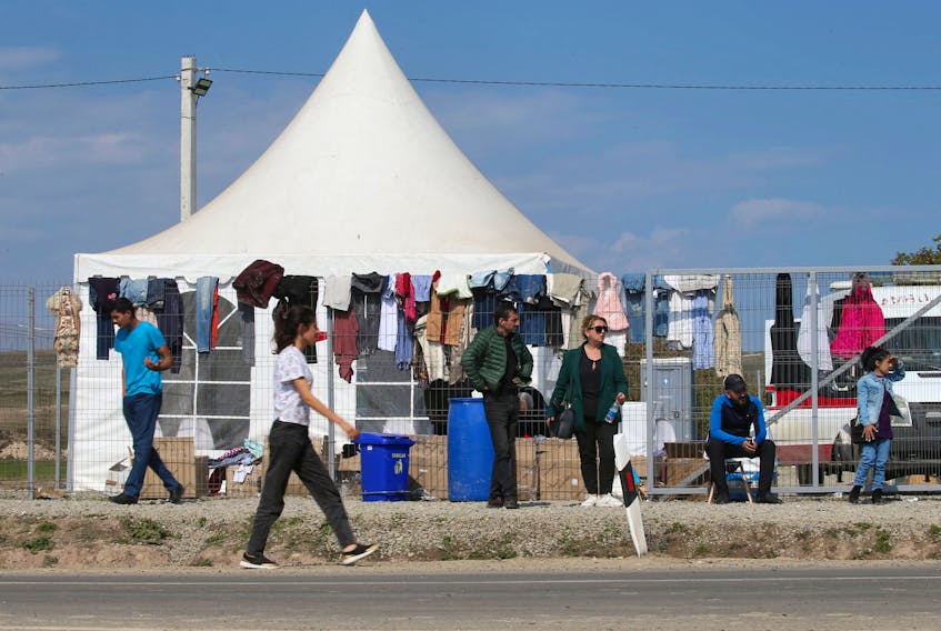 GENEVA (Reuters) - More than 88,000 people have crossed into Armenia from Nagorno-Karabakh so far and the total number of arrivals could rise to 120,000, said a U.N. refugee agency official on Friday.