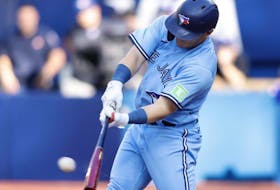 Blue Jays batter Daulton Varsho hits a two-RBI single in the fourth inning against the Rays at Rogers Centre in Toronto, Saturday, Sept. 30, 2023.
