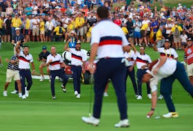 By Martyn Herman ROME (Reuters) - American Patrick Cantlay silenced the taunts of thousands of European fans to earn his side an emotion-charged point in their desperate battle to stay in the Ryder