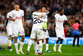 By Ken Ferris LONDON (Reuters) - Tottenham Hotspur left it late to down nine-man Liverpool 2-1 and had an own goal by Joel Matip to thank for their stoppage-time win as the defender turned the ball
