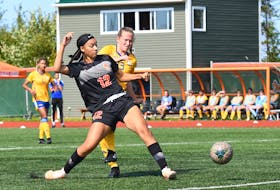 Cape Breton Capers' Alliyah Rowe, left, fends off Adèle Emilie Roy of the Moncton Aigles Bleues during their AUS women's soccer match on Sunday at Ness Timmons Soccer Field. The Capers women went on to win 7-1. CONTRIBUTED