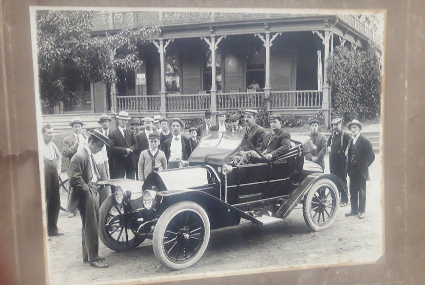 Arch Pelton, seated on the right in one of the 25 McKay cars that were made in Kentville, has never been officially recognized for his pioneering role in the creation of the McKay car.Photo courtesy of the Comeau Family Collection