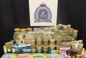 Charges are pending after more than 10,000 grams of illegal cannabis and over $17,000 in cash was seized in Saint John and Moncton. File