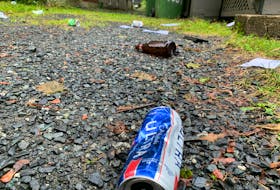 Sept 26, 2021 - discarded beer cans and bottles still lay scattered on some properties on Larch Street in Halifax the day after a massive street party. - Stuart Peddle