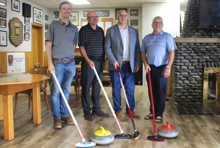 The Truro Curling Club has received $200,000 through the provincial government's Sustainable Community Challenge Fund to install solar panels. Pictured at the announcement, from left, are David Quinn, Earle Atkinson, MLA Dave Ritcey and Terry Amirault. Brendyn Creamer