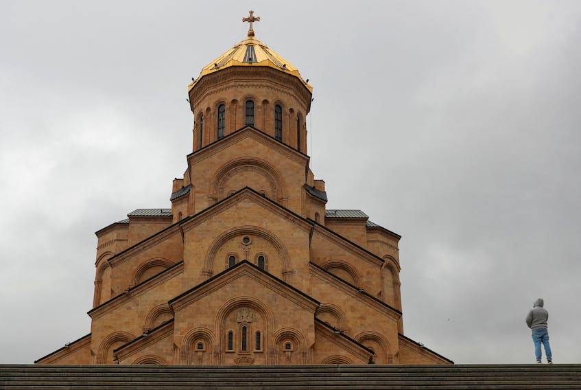 A view shows the Holy Trinity Cathedral currently exhibiting an icon, an element of which depicts Soviet leader Joseph Stalin being blessed by Russian Orthodox saint Matrona of Moscow, and that was recently defaced with paint in an act of protest amid controversy over the icon’s apparent honouring of Stalin, in Tbilisi, Georgia, January 10, 2024.