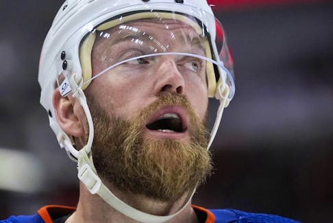 Edmonton Oilers defenceman Mattias Ekholm looks up at a replay while facing the Chicago Blackhawks on Tuesday, Jan. 9, 2024, in Chicago.