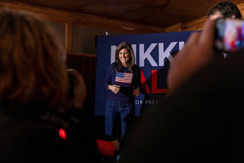 Republican presidential candidate and former U.S. Ambassador to the United Nations Nikki Haley greets people during a campaign stop at Mickey's Irish Pub ahead of the Iowa caucus vote in Waukee, Iowa, U.S., January 9, 2024.