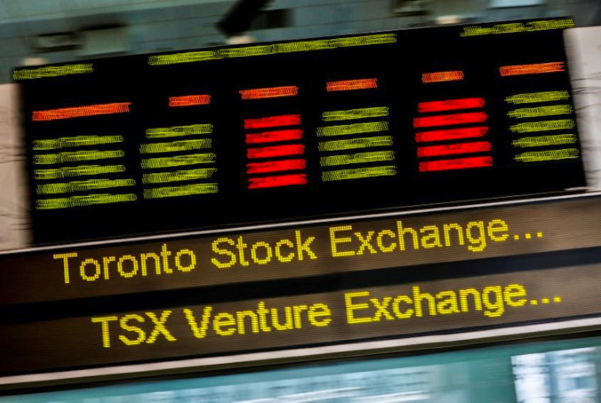 A sign board displaying Toronto Stock Exchange (TSX) stock information is seen in Toronto June 23, 2014.