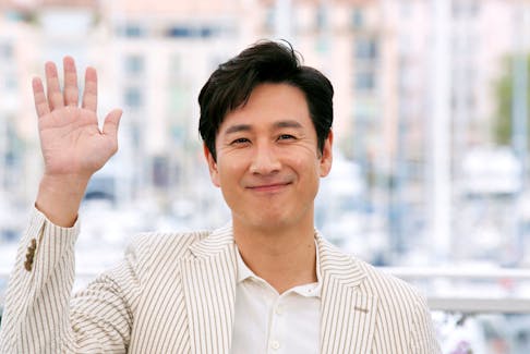 72nd Cannes Film Festival - Photocall for the film "Parasite" (Gisaengchung) in competition - Cannes, France, May 22, 2019.  Cast member Lee Sun-kyun poses.