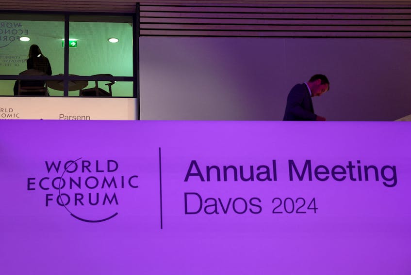 A person walks inside the venue, on the first day of the annual meeting in Davos, Switzerland, January 15, 2024.