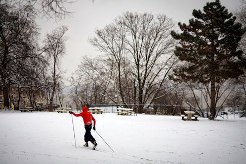 A man cross-country skis along the bank of the Hudson River during winter weather in the New York City suburb of Nyack, New York, U.S., January 16, 2024.
