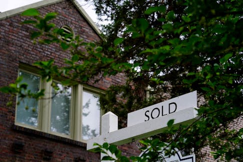 A "sold" sign is seen outside of a recently purchased home in Washington, U.S., July 7, 2022.