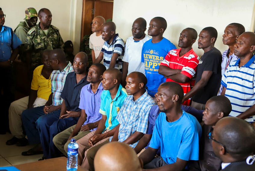 Paul Mackenzie, a Kenyan cult leader accused of ordering his followers, who were members of the Good News International Church, to starve themselves to death in Shakahola forest, stands with other suspects in the dock at the Malindi Law Courts in Malindi, Kilifi, Kenya January 17, 2024.