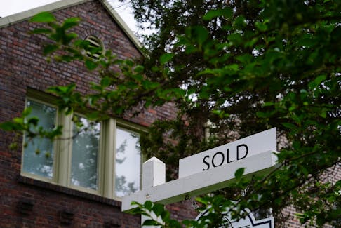 A "sold" sign is seen outside of a recently purchased home in Washington, U.S., July 7, 2022.