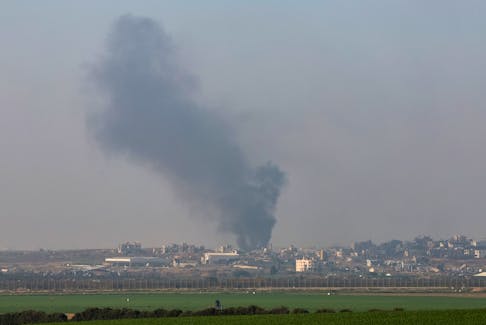 Smoke rises over Gaza, amid the ongoing conflict between Israel and the Islamist group Hamas, as seen from Israel, January 19, 2024.