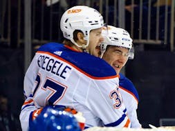 Ryan McLeod, right, has been a big spark plug for the Oilers over the last two games, scoring three goals and one assist. He scored once and added an assist in the Oilers 4-3 win over the New York Rangers on Saturday, Dec. 30, 2023.