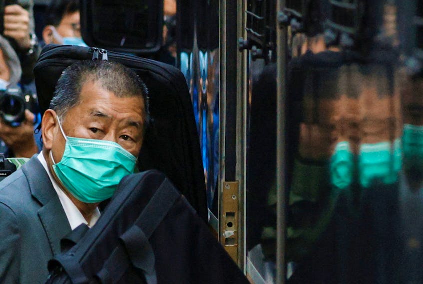 Media tycoon Jimmy Lai, founder of Apple Daily, looks on as he leaves the Court of Final Appeal by prison van, in Hong Kong, China February 1, 2021.