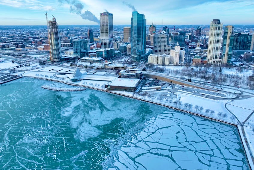 An aerial view of the downtown covered in snow, in Milwaukee, Wisconsin, U.S., January 18, 2024, in this picture obtained from a social media video. Isaac Rowlett Media/via REUTERS