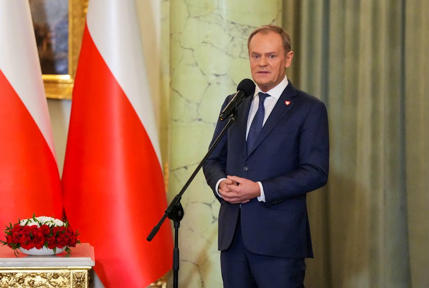 Newly appointed Polish Prime Minister Donald Tusk speaks as he attends the cabinet swearing-in ceremony at the Presidential Palace in Warsaw, Poland December 13, 2023.