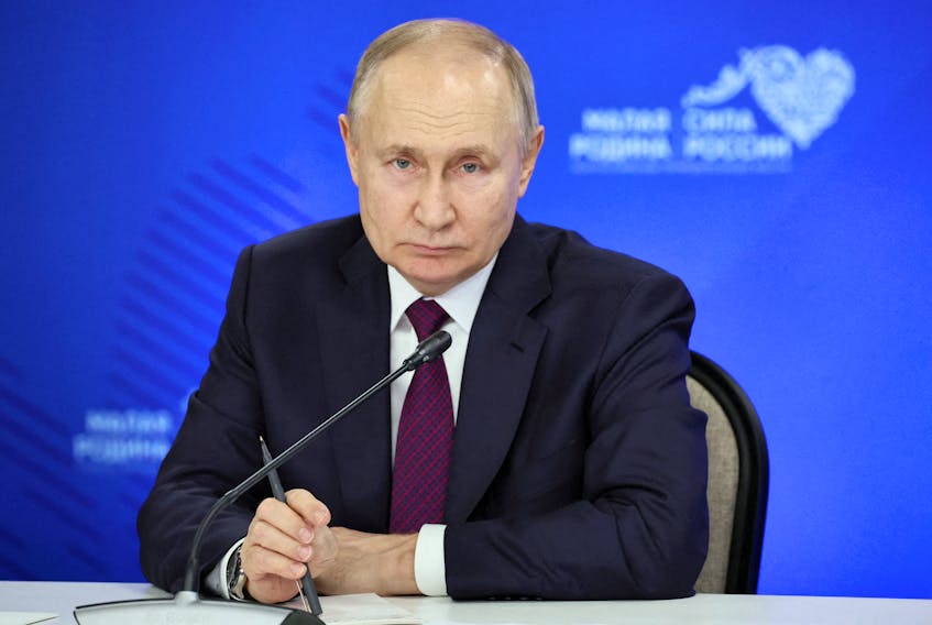 Russian President Vladimir Putin attends a meeting with the heads of municipalities during an all-Russian municipal forum in the town of Odintsovo in the Moscow region, Russia, January 16, 2024.  Sputnik/Sergei Savostyanov/Pool via