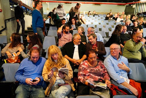 Audience members wait for a “Comedy for Koby” comedy show to begin at a theatre in Tel Aviv, January 21, 2024.