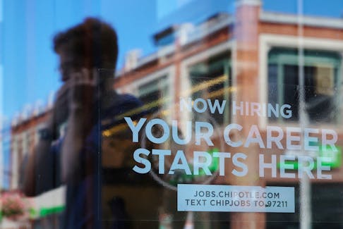 A Chipotle restaurant advertises it is hiring in Cambridge, Massachusetts, U.S., August 28, 2023.