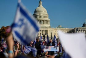 Jewish Americans and supporters of Israel gather in solidarity with Israel and protest against antisemitism, amid the ongoing conflict between Israel and the Palestinian group Hamas, during a rally on the National Mall in Washington, U.S, November 14, 2023.