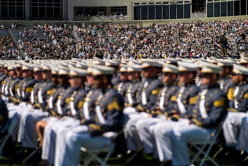 People attend the 2023 graduation ceremony at the United States Military Academy (USMA), at Michie Stadium in West Point, New York, U.S., May 27, 2023.
