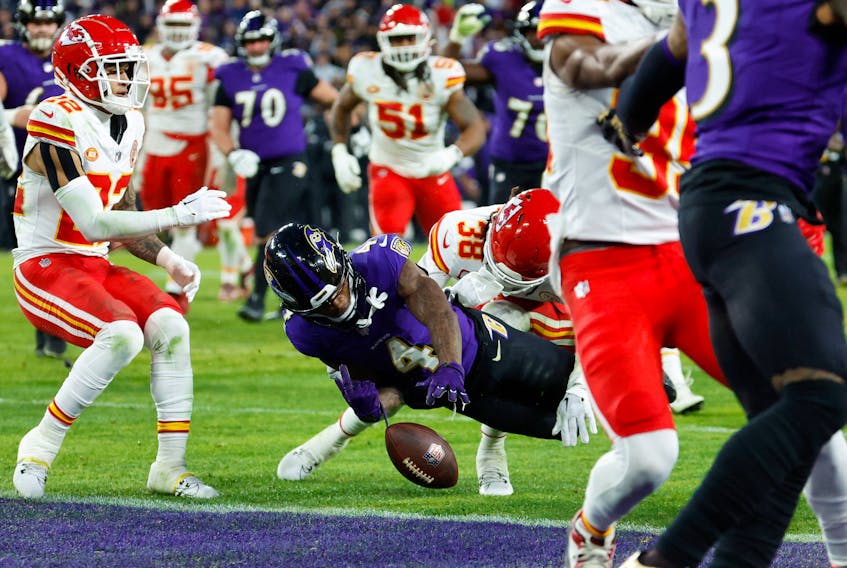 Jan 28, 2024; Baltimore, Maryland, USA; Baltimore Ravens wide receiver Zay Flowers (4) fumbles the ball as Kansas City Chiefs cornerback L'Jarius Sneed (38) defends during the second half in the AFC Championship football game at M&T Bank Stadium. Mandatory Credit: Tommy Gilligan-USA TODAY Sports