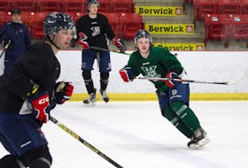 Bates Ling, right, takes part in a drill during the Bage Valley Wildcats practice Jan. 24 at the Kings Mutual Century Centre in Berwick.  
Jason Malloy