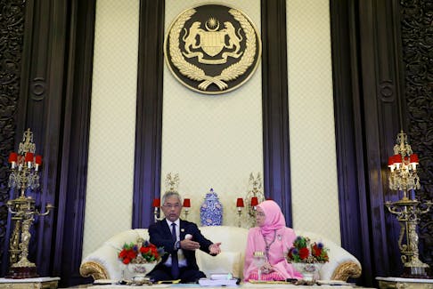 Malaysia's King Al-Sultan Abdullah, accompanied by Queen Tunku Azizah Aminah Maimunah Iskandariah, speaks during an interview at National Palace in Kuala Lumpur, Malaysia January 3, 2024.