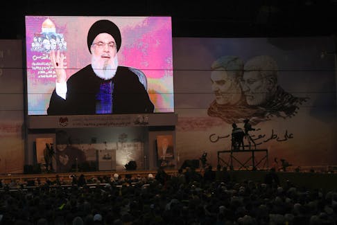 Lebanon's Hezbollah leader Sayyed Hassan Nasrallah addresses his supporters through a screen during a ceremony to mark the fourth anniversary of the killing of senior Iranian military commander General Qassem Soleimani in a U.S. attack, in Beirut's southern suburbs, Lebanon January 3, 2024.