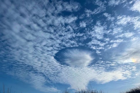 Elaine Shea caught this fallstreak hole, also known as a holepunch cloud in Donkin, N.S. -Contributed